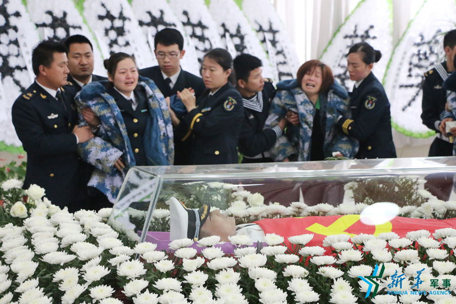 ↑資料圖片：張超烈士遺體告別儀式現(xiàn)場(chǎng)。