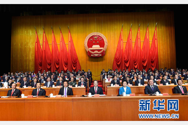 10月1日，慶祝中華人民共和國成立66周年暨新疆維吾爾自治區(qū)成立60周年大會在新疆人民會堂隆重舉行。 新華社記者 饒愛民 攝