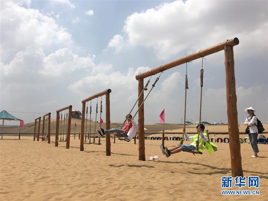 (新華全媒頭條·在習(xí)近平新時代中國特色社會主義思想指引下——新時代新作為新篇章·圖文互動)(11)綠富同興畫卷在沙海中鋪展——庫布其沙漠生態(tài)治理紀實