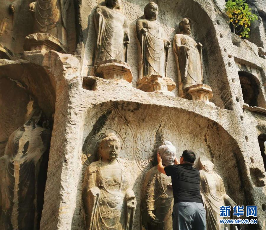 （圖文互動(dòng)）（4）合體了，龍門石窟流散佛首首次實(shí)現(xiàn)“數(shù)字復(fù)位”