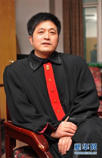 （圖文互動(dòng)）其人如蘭，既潔且馨——追記“全國(guó)模范法官”胡國(guó)運(yùn)