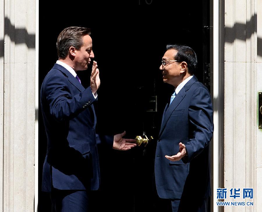 6月17日，中國國務(wù)院總理李克強在倫敦唐寧街10號首相府同英國首相卡梅倫舉行中英總理年度會晤。新華社記者 李濤 攝