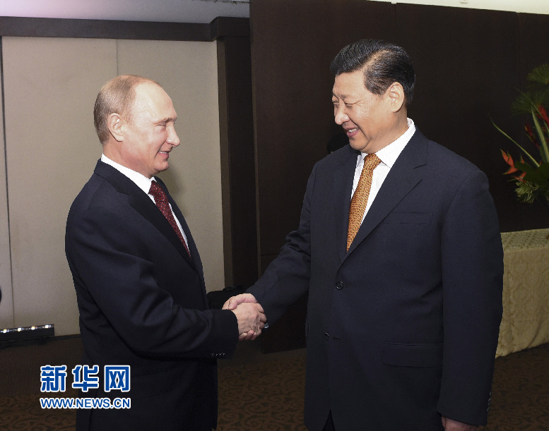 7月14日，國家主席習(xí)近平在巴西福塔萊薩會見俄羅斯總統(tǒng)普京。新華社記者李學(xué)仁攝