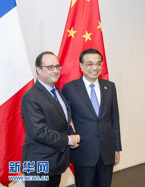 10月16日，中國國務(wù)院總理李克強在米蘭會見法國總統(tǒng)奧朗德。新華社記者 王曄 攝