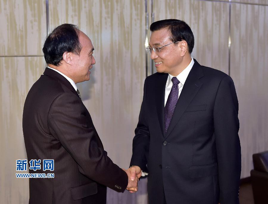 1月22日，中國國務(wù)院總理李克強(qiáng)在瑞士蘇黎世會見國際電信聯(lián)盟秘書長趙厚麟。 新華社記者 李濤 攝 
