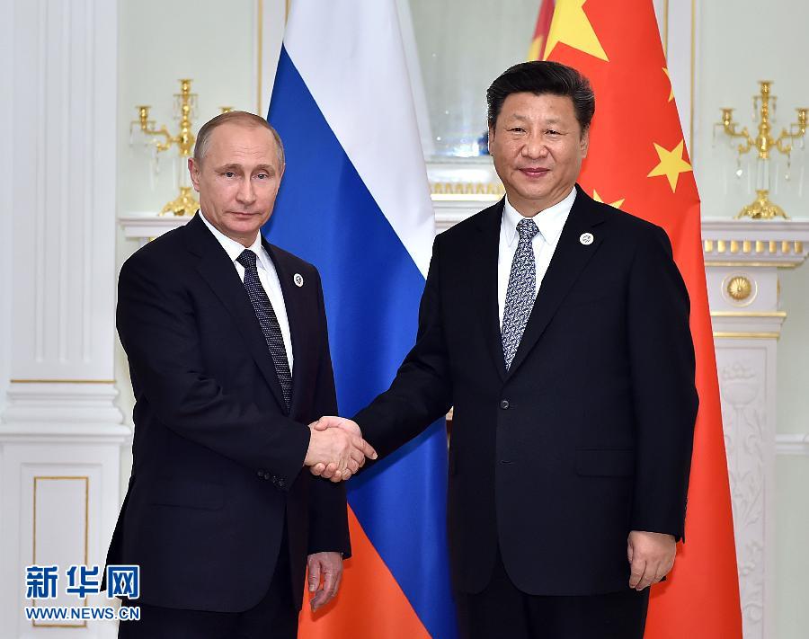 6月23日，國家主席習(xí)近平在烏茲別克斯坦塔什干會見俄羅斯總統(tǒng)普京。新華社記者李濤攝