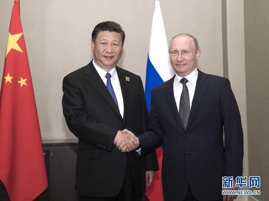 6月8日，國(guó)家主席習(xí)近平在阿斯塔納會(huì)見俄羅斯總統(tǒng)普京。 新華社記者蘭紅光 攝
